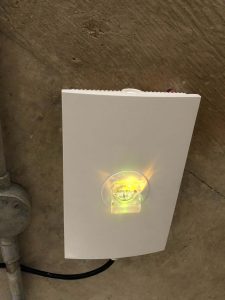 Emergency Lighting - Light unit shown in daylight on standby