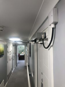 Auto-closer close-up and Emergency Lighting in corridor 02